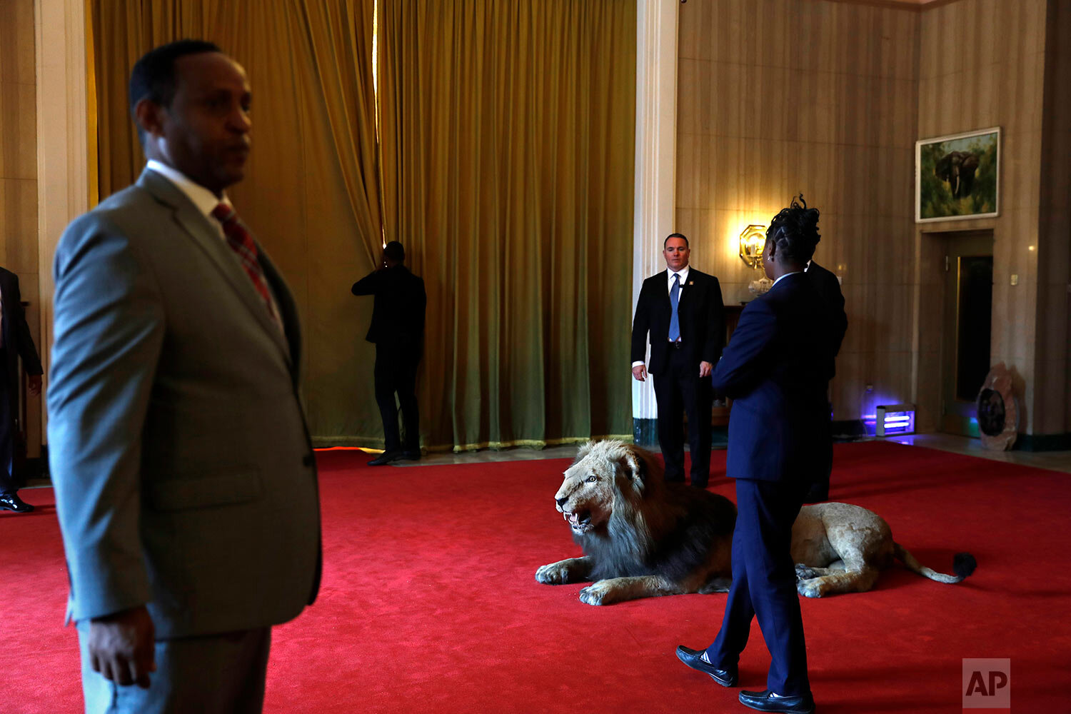  U.S. and Ethiopian security personnel secure the entry hall at the Presidential Palace in Addis Ababa, Ethiopia, while behind the curtain U.S. White House senior adviser Ivanka Trump meets with Ethiopia's President Sahle-Work Zewde on April 15, 2019