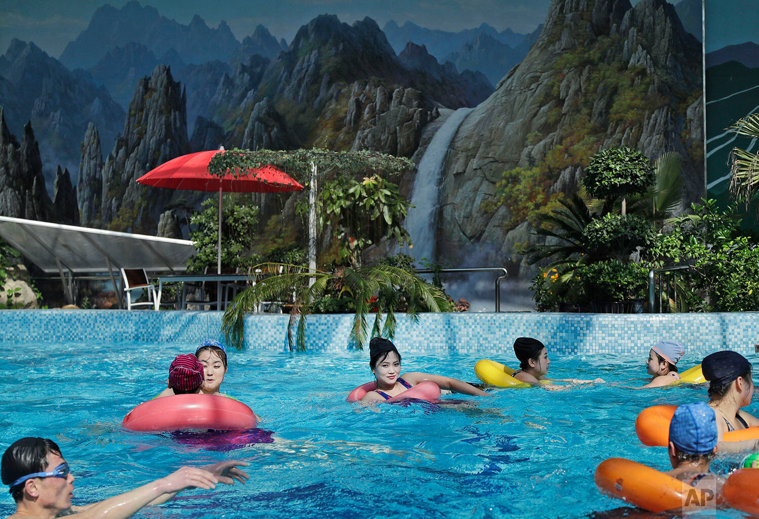  North Koreans swim in an indoor swimming pool in Pyongyang, North Korea, on March 13, 2019. (AP Photo/Dita Alangkara) 