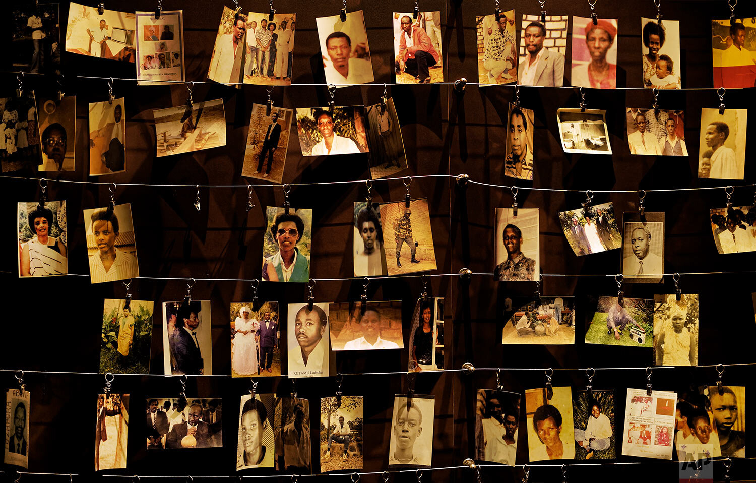  Family photos of some of those who died hang on display in an exhibition at the Kigali Genocide Memorial centre in the Rwandan capital, Kigali, on April 5, 2019. Rwanda commemorated the 25th anniversary of the country's descent into an orgy of viole