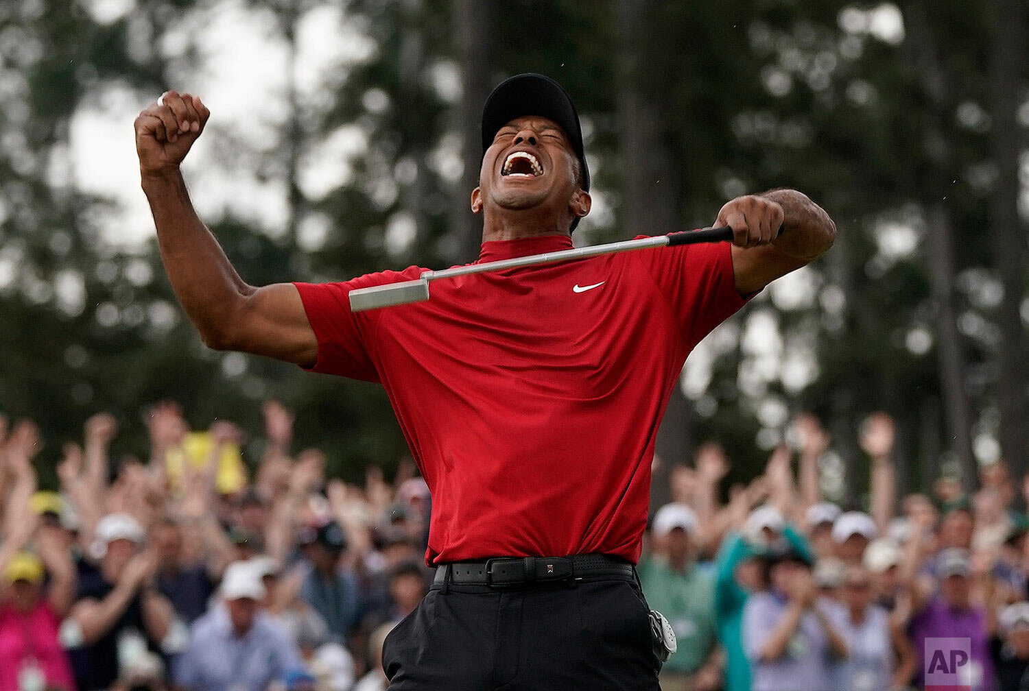  Tiger Woods reacts after winning the Masters golf tournament in Augusta, Ga. on April 14, 2019. (AP Photo/David J. Phillip) 