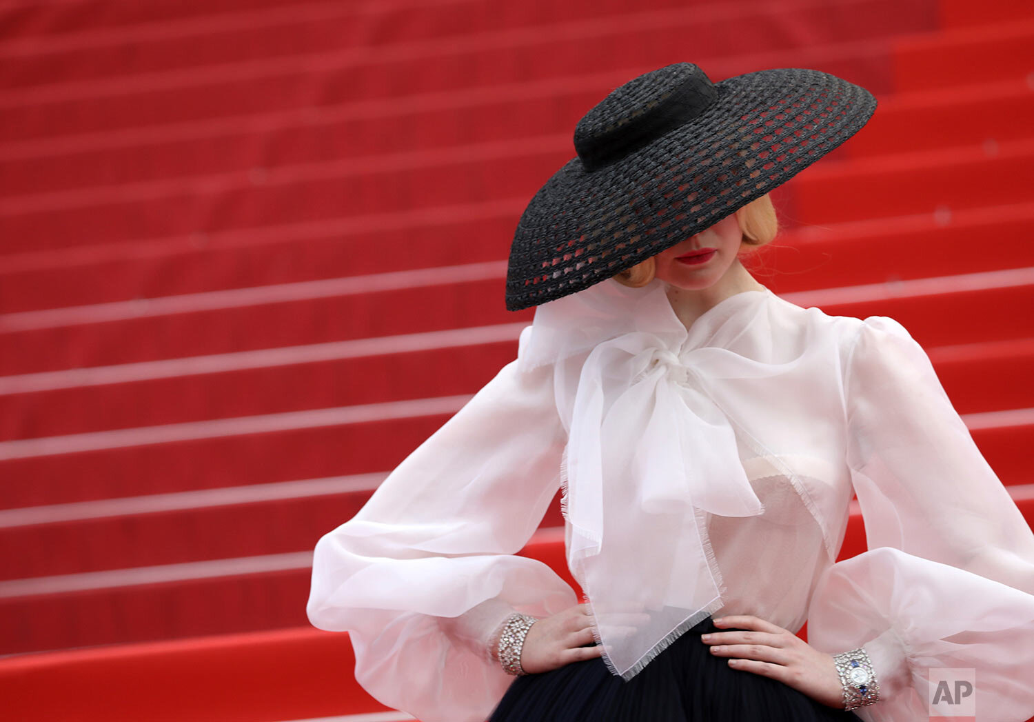  Jury member Elle Fanning poses for photographers upon arrival at the premiere of the film "Once Upon a Time in Hollywood" at the 72nd international film festival in Cannes, France, on May 21, 2019. (Photo by Vianney Le Caer/Invision/AP) 