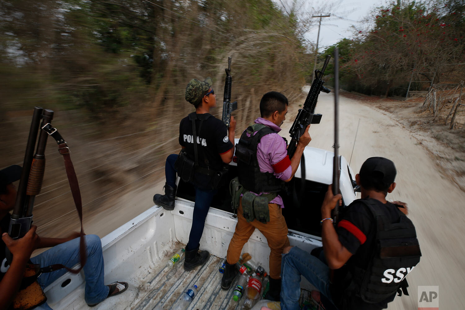  Members of the vigilante group United Front of Guerrero Community Police (FUPCEG) patrol in Xaltianguis, in Mexico's Guerrero state, on May 29, 2019. (AP Photo/Rebecca Blackwell) 