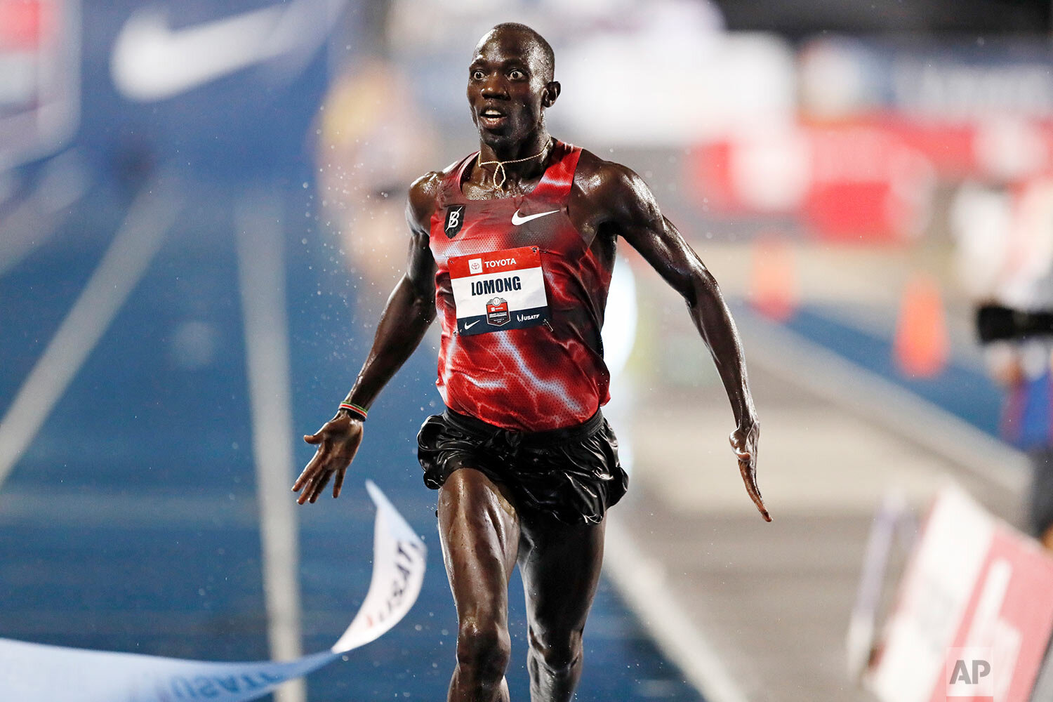  Lopez Lomong wins the men's 10,000-meter run at the U.S. Track & Field Outdoor Championships in Des Moines, Iowa, on July 25, 2019. (AP Photo/Charlie Neibergall) 