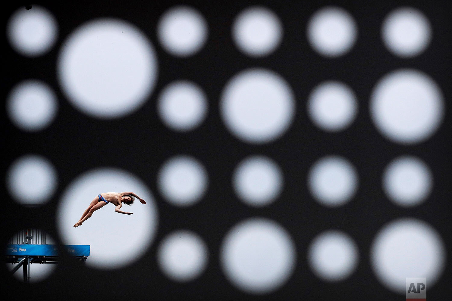  Gold medalist Gary Hunt of Britain dives during the men's high diving competition at the World Swimming Championships in Gwangju, South Korea, on July 24, 2019. (AP Photo/Mark Schiefelbein) 