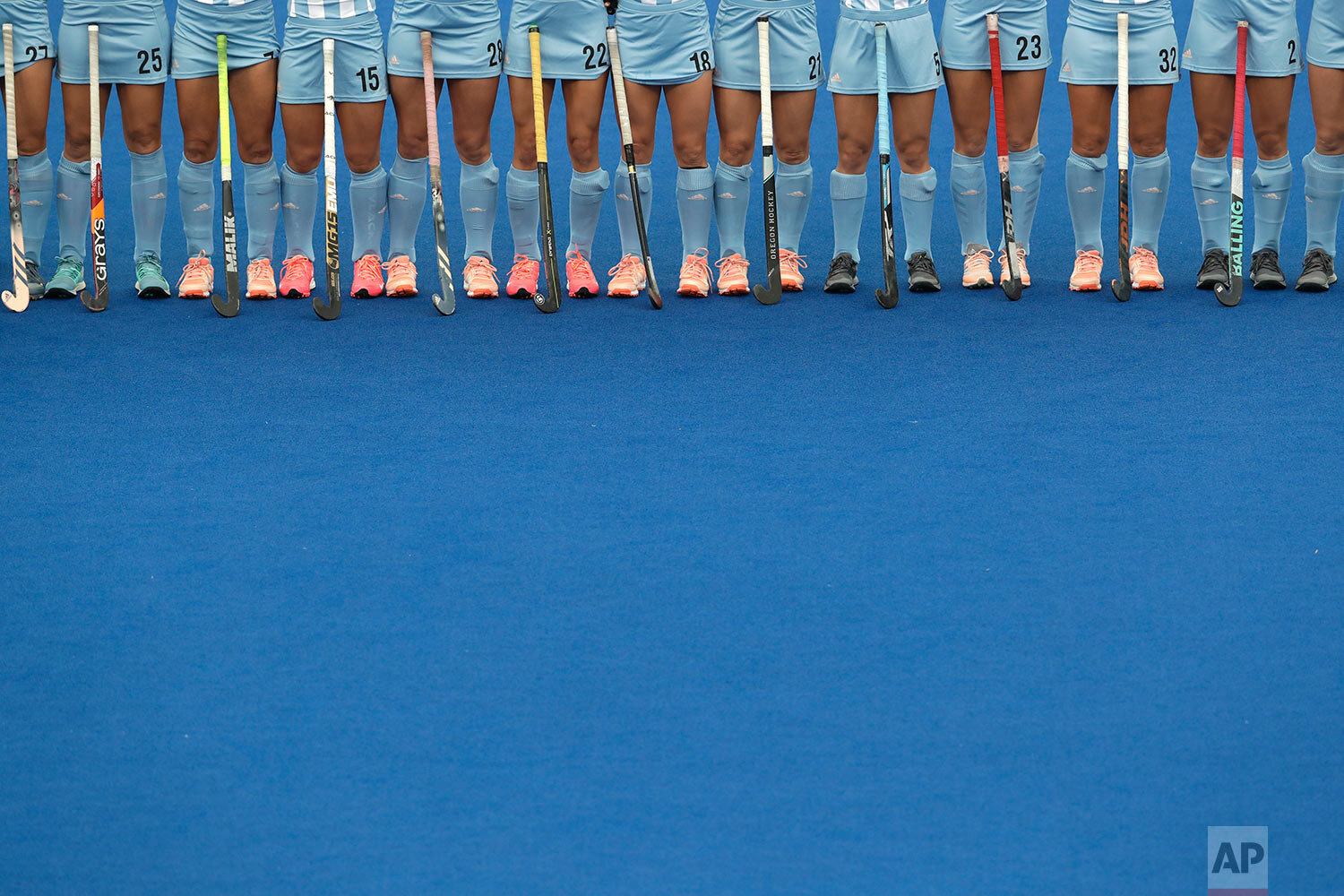  Argentina's hockey players stand in line during the playing of national anthems before their women's preliminaries pool WA against Canada at the Pan American Games in Lima, Peru, on July 31, 2019. Argentina won 3-0. (AP Photo/Silvia Izquierdo) 