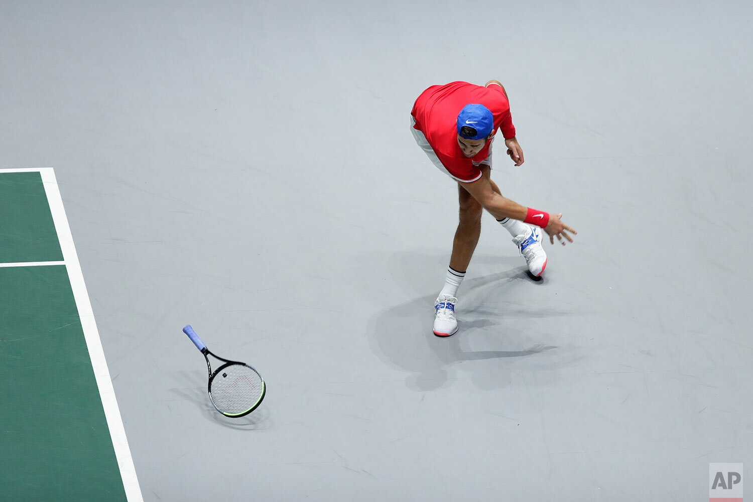  Russia's Karen Khachanov throws his racket during their Davis Cup semifinal match against Canada's Denis Shapovalov, in Madrid, Spain, Saturday, Nov. 23, 2019. (AP Photo/Manu Fernandez) 