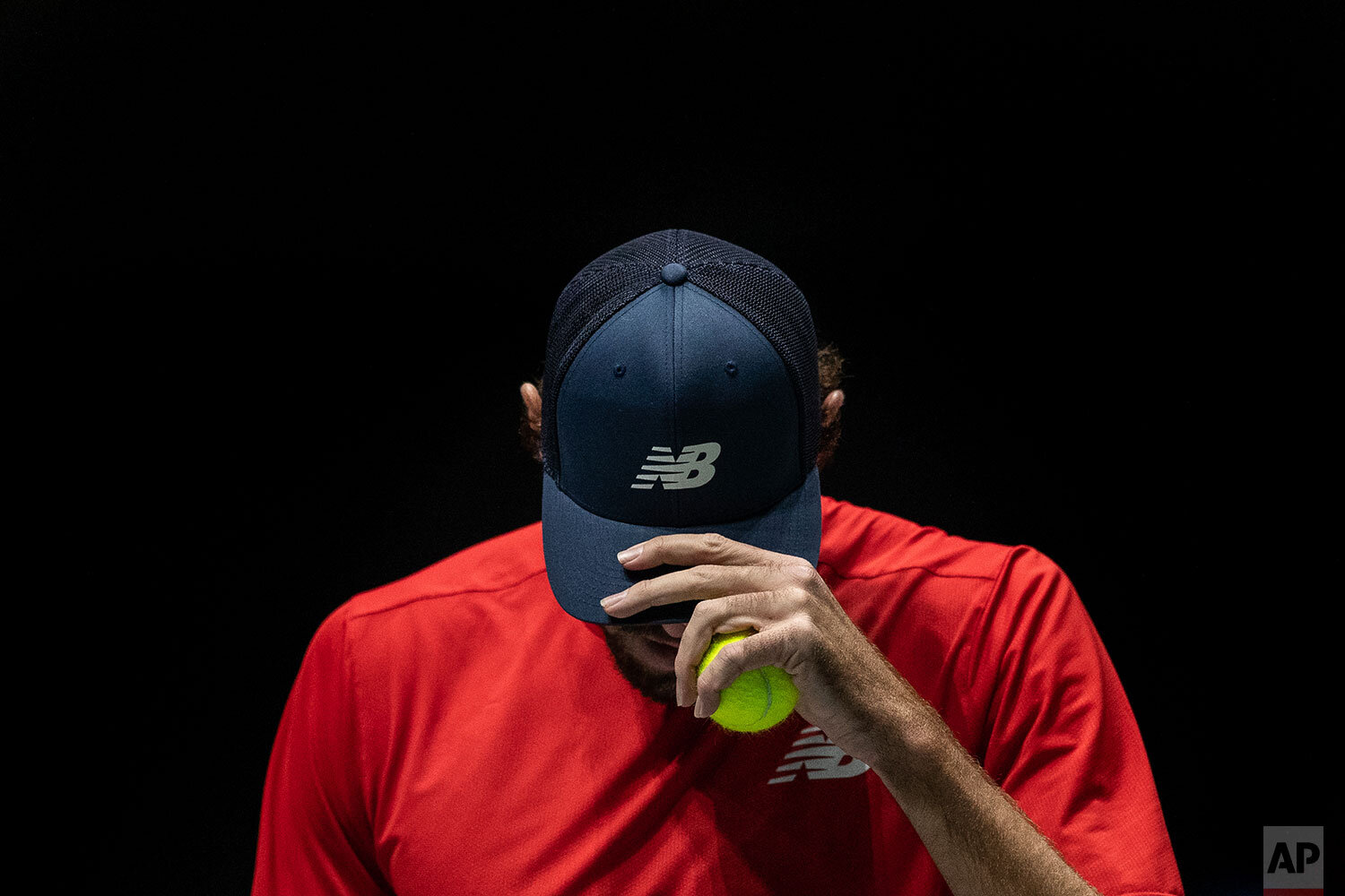  Reilly Opelka plays against Canada’s Vasek Pospisil during their Davis Cup tennis match in Madrid, Spain, Tuesday, Nov. 19, 2019. (AP Photo/Bernat Armangue) 