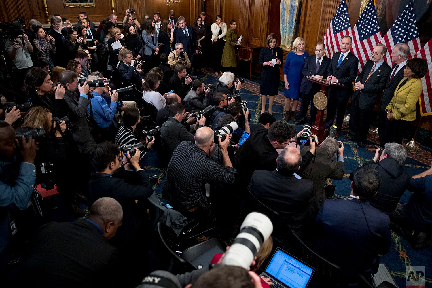  House Intelligence Committee Chairman Adam Schiff, D-Calif., fourth from right, accompanied by from left, House Speaker Nancy Pelosi of Calif., House Committee on Oversight and Reform Chairwoman Carolyn Maloney, D-N.Y., House Judiciary Committee Cha