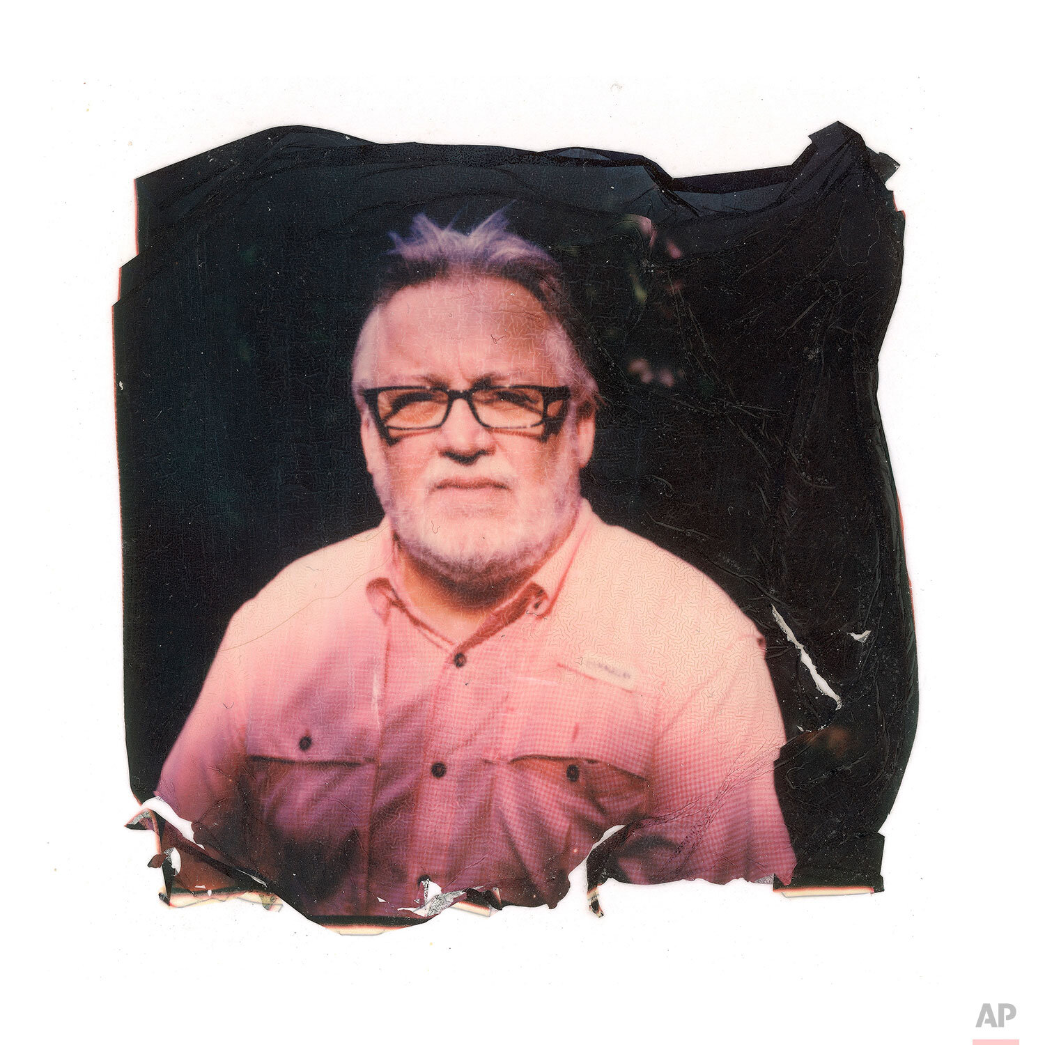  In this image made from a Polaroid emulsion transfer, Mark Belenchia, 64, poses for a portrait in his garden on Monday, June 10, 2019, in Jackson, MS.. Belenchia, a clergy abuse survivor has found meaning in activism. (AP Photo/Wong Maye-E) 