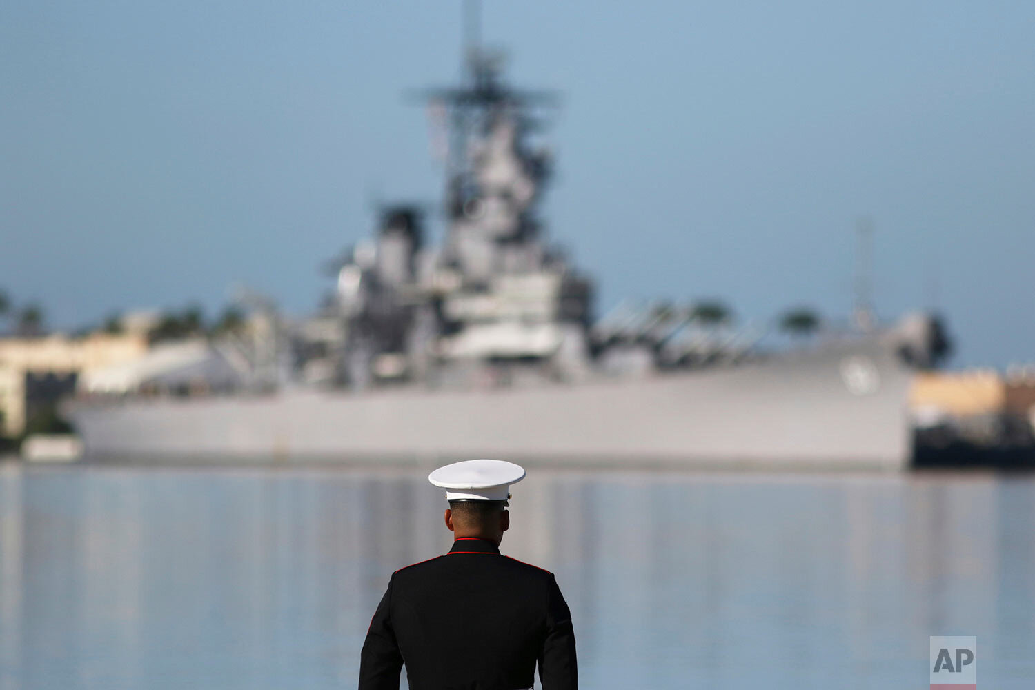  A U.S. Marine stands in front of the USS Missouri during a ceremony to mark the 78th anniversary of the Japanese attack on Pearl Harbor, Saturday, Dec. 7, 2019 at Pearl Harbor, Hawaii. Survivors and members of the public gathered to remember those k