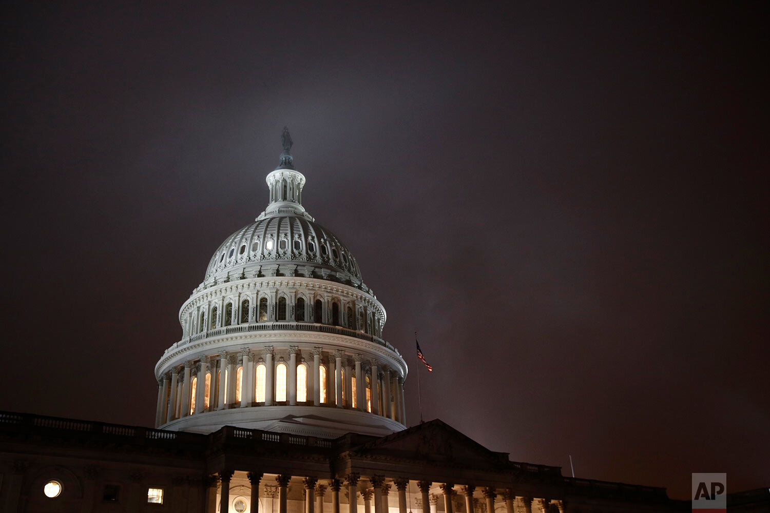  Mist rolls over the U.S. Capitol dome early Monday, Dec. 9, 2019, before a House Judiciary Committee hearing regarding the impeachment inquiry of President Donald Trump on Capitol Hill in Washington. (AP Photo/Patrick Semansky) 