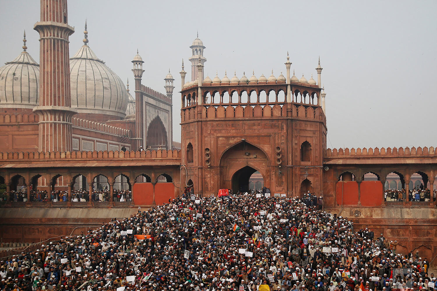  People gather for a protest against the Citizenship Amendment Act after Friday prayers outside the Jama Masjid in New Delhi, India, Friday, Dec. 20, 2019. Police banned public gatherings in parts of the Indian capital and other cities for a third da