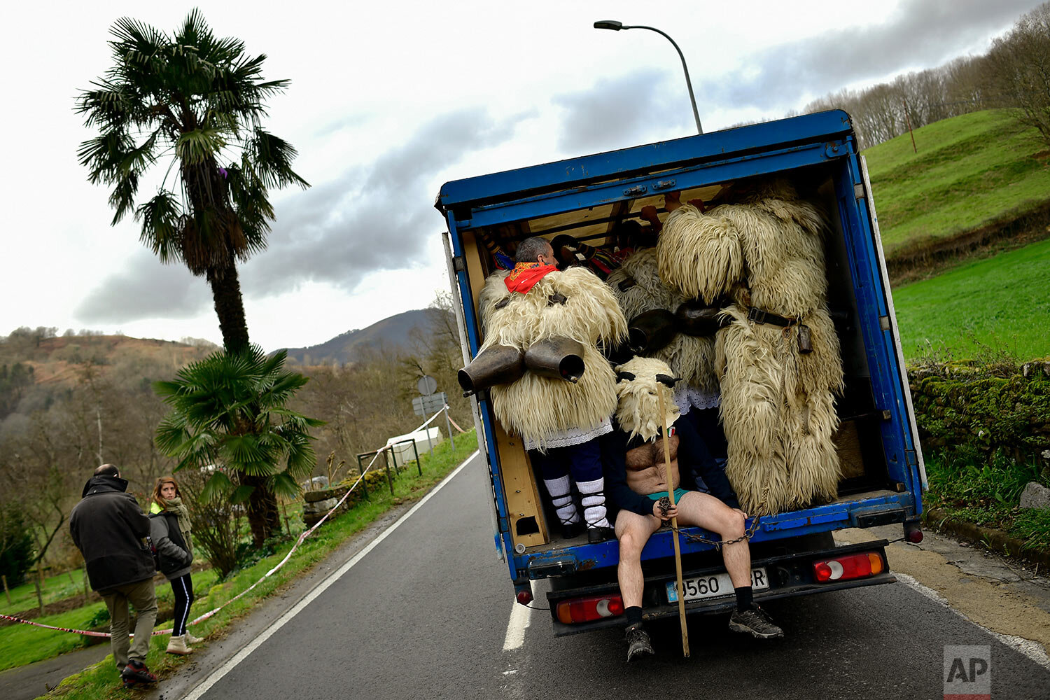  In this Tuesday Jan. 28, 2020 photo, ''Joaldunaks'' use a small truck to go to the next village while taking part in the Carnival in the small Pyrenees village of Ituren, northern Spain.  (AP Photo/Alvaro Barrientos) 
