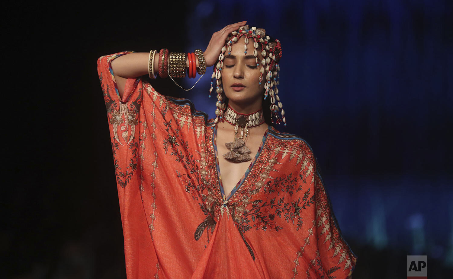A model displays creations by Rajdeep Ranawat during Lakme Fashion Week in Mumbai, India, Sunday, Feb. 16, 2020. (AP Photo/Rafiq Maqbool)