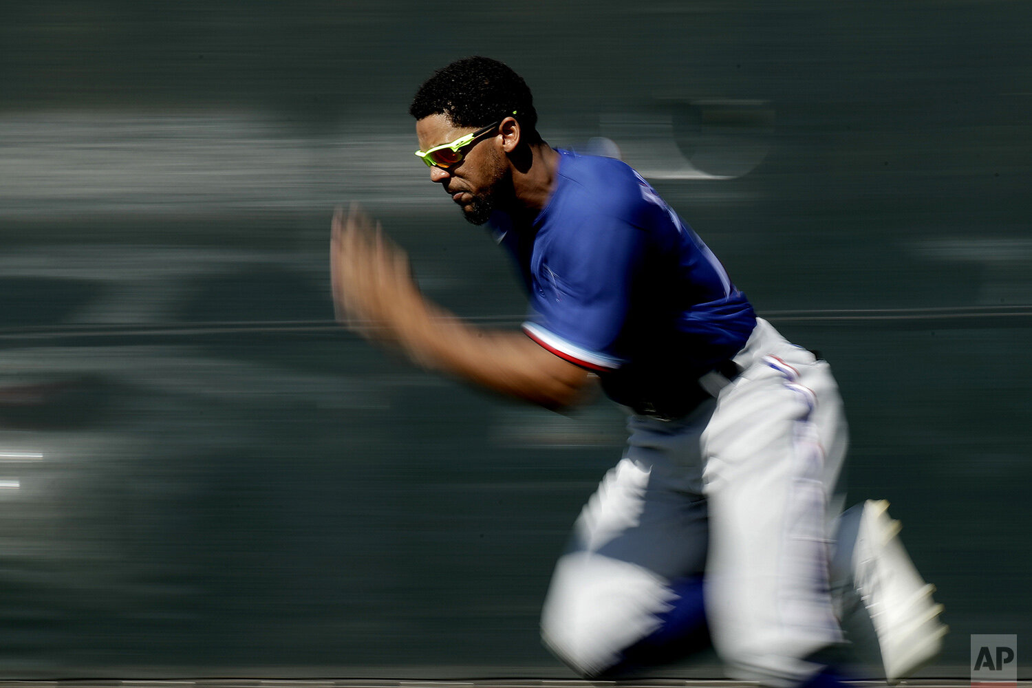  Texas Rangers’ Leody Taveras runs a sprint during spring training baseball practice Monday, Feb. 17, 2020, in Surprise, Ariz. (AP Photo/Charlie Riedel) 