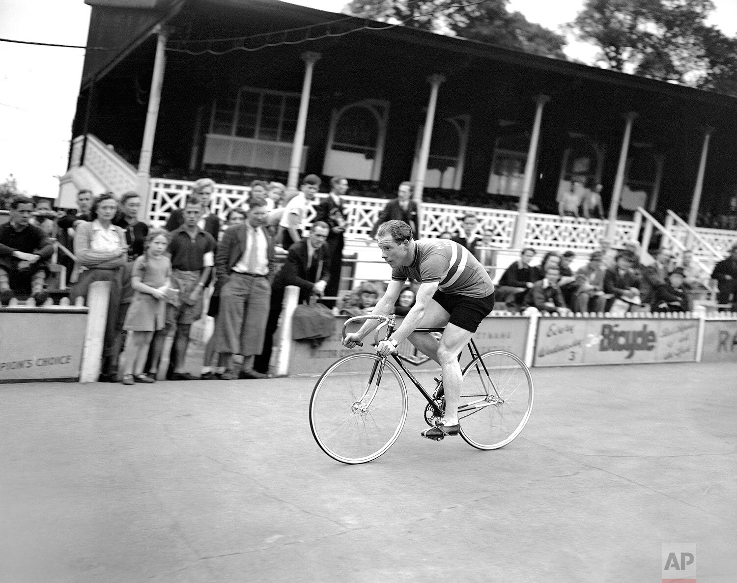  Reg Harris, British world amateur sprint cyclist champion, seen on his racing machine, on the Olympic cycling tracks at Herne Hill Velodrome in London, United Kingdom, on August 4, 1948.  (AP Photo/John Rider-Rider) 