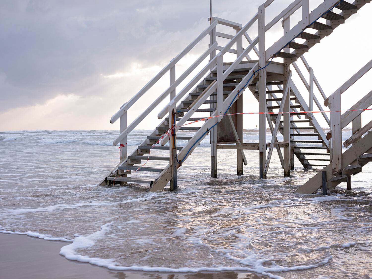  This Thursday, March 19, 2020 photo shows stairway to lifeguard tower at Tel Aviv's beachfront wrapped in tape to prevent public access. (AP Photo/Oded Balilty) 