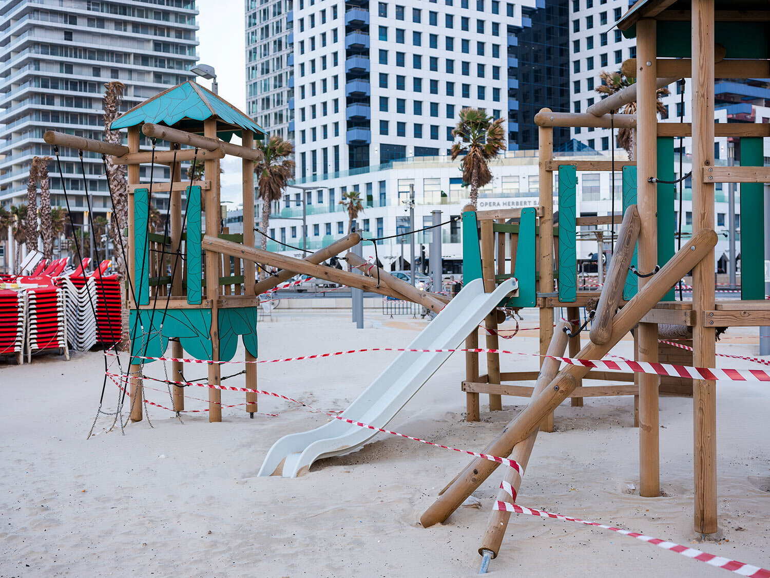  This Thursday, March 19, 2020 photo shows playground at Tel Aviv's beachfront wrapped in tape to prevent public access. (AP Photo/Oded Balilty) 