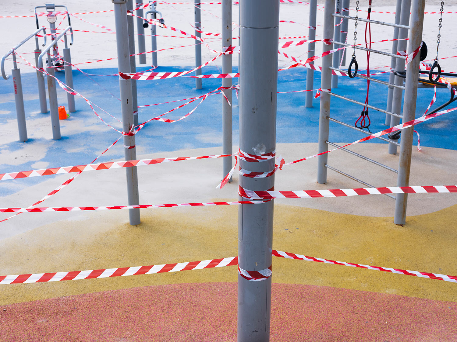  This Thursday, March 19, 2020 photo shows a free gym at Tel Aviv's beachfront wrapped in tape to prevent public access.  (AP Photo/Oded Balilty) 