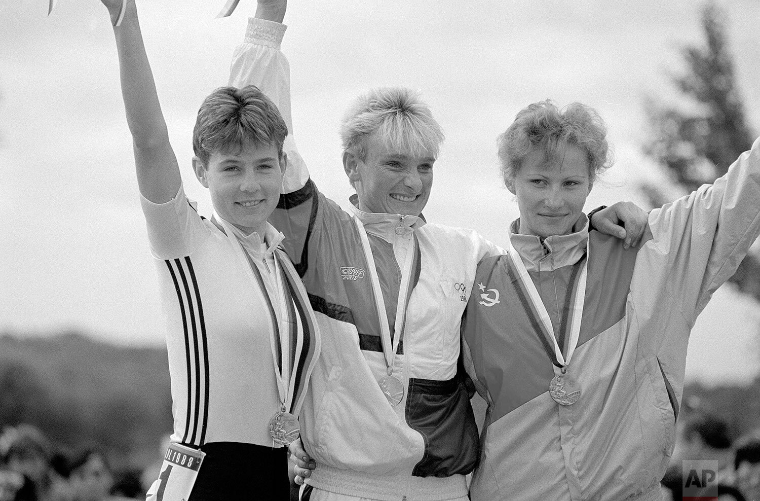  The winners of the 82-kilometer individual road race acknowledge the crowd after accepting their Olympic medals in Seoul, Sept. 26, 1988. From left: Jutta Niehaus of West Germany, silver; Monique Knol of the Netherlands, and Laima Zilporite of the S