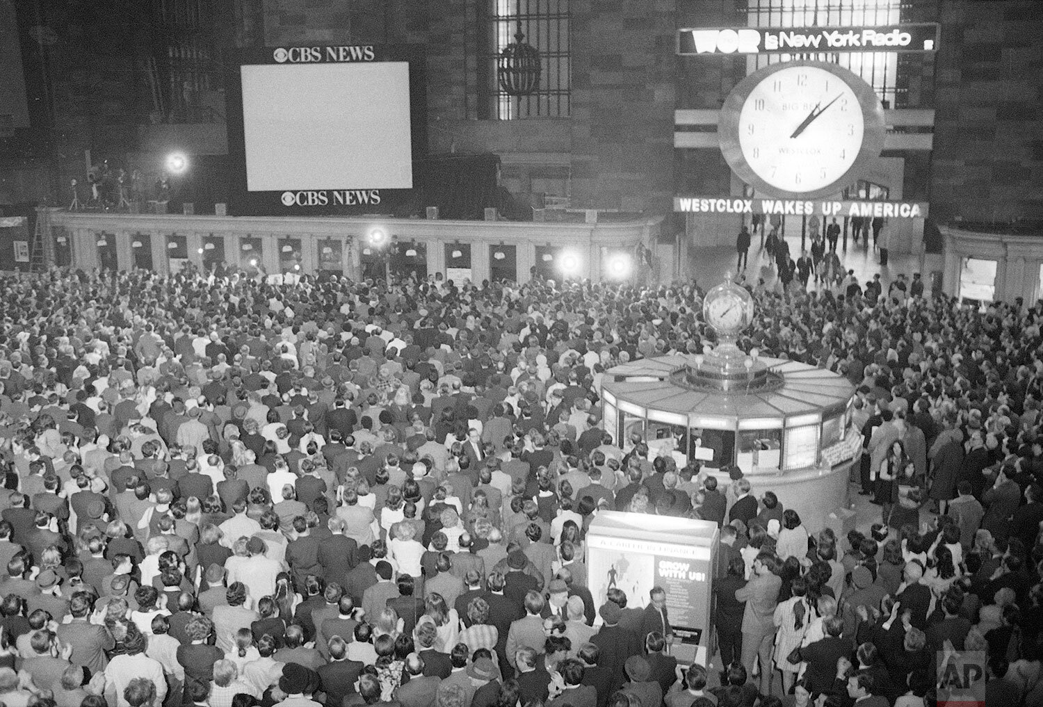  All eyes are focused on the television screen in Grand Central Station in New York City, at 1pm, April 17, 1970 watching for the safe landing of the Apollo 13 astronauts in the Pacific. (AP Photo/J. Spencer Jones) 