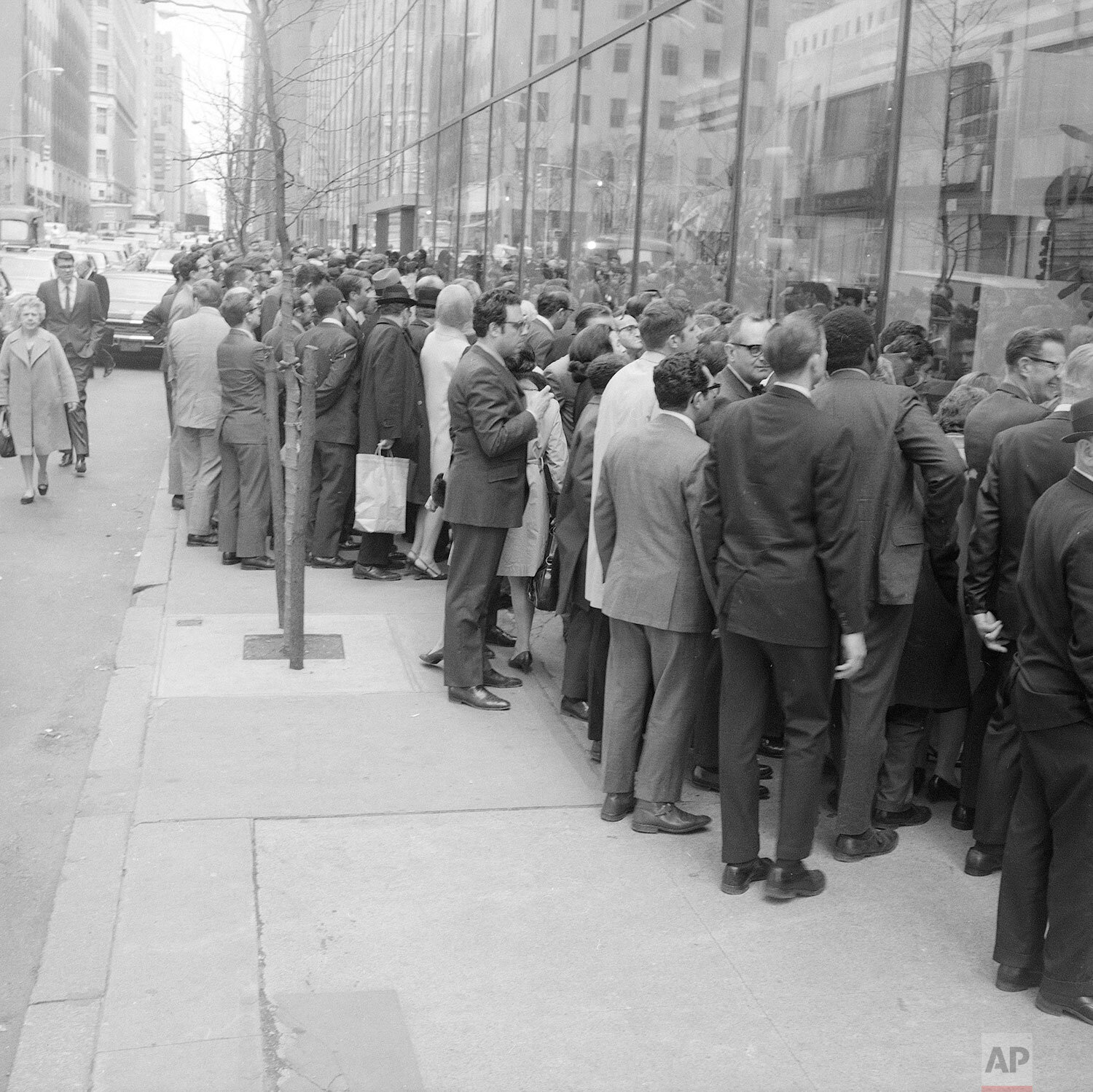  Television screens in windows of RCA Exhibition Hall on 49th street in Midtown Manhattan are carefully scrutinized by passersby concerned with the safety of the Apollo 13 astronauts near splashdown on the afternoon of April 17, 1970 (AP Photo) 