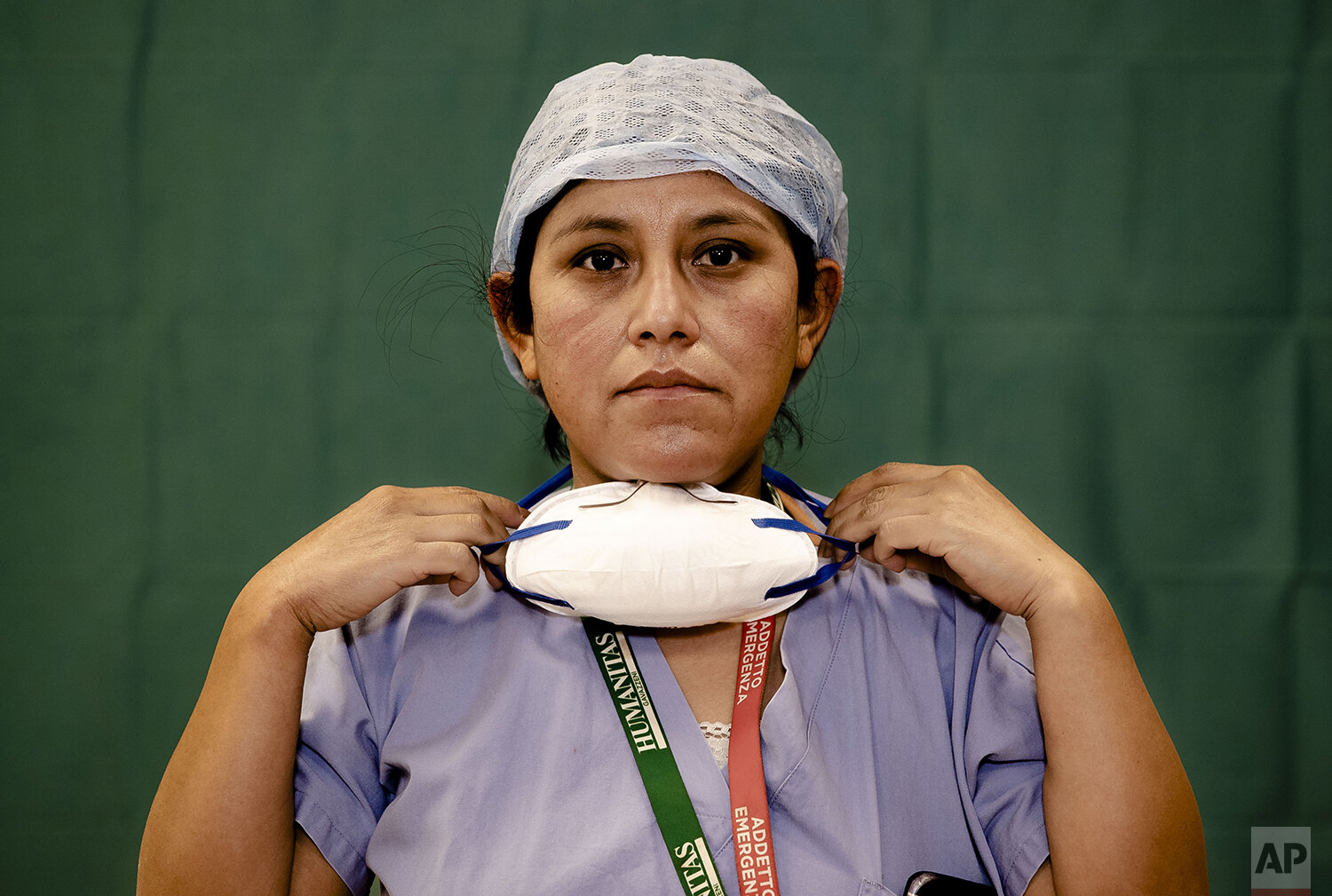  Ana Travezano, 39, a nurse at the Humanitas Gavazzeni Hospital in Bergamo, Italy poses for a portrait at the end of her shift Friday, March 27, 2020. The intensive care doctors and nurses on the front lines of the coronavirus pandemic in Italy are a