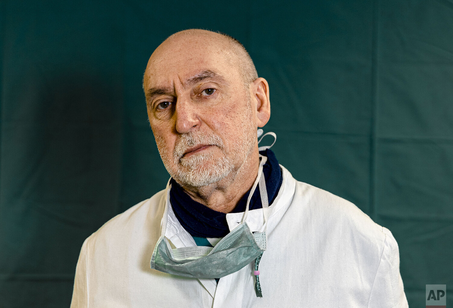  Director of the Intensive Care unit Gabriele Tomasoni, 65, poses for a portrait at the Brescia Spedali Civic Hospital, in Brescia, Italy Friday, March 27, 2020. The intensive care doctors and nurses on the front lines of the coronavirus pandemic in 