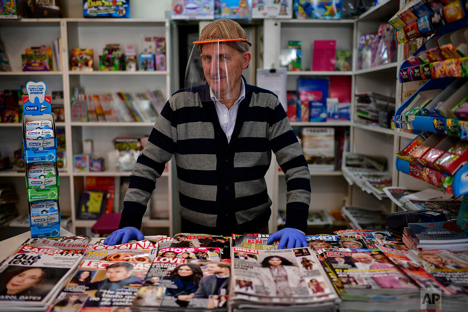  Antonio Leoz poses for a photograph in his book shop in Pamplona, northern Spain. (AP Photo/Alvaro Barrientos) 