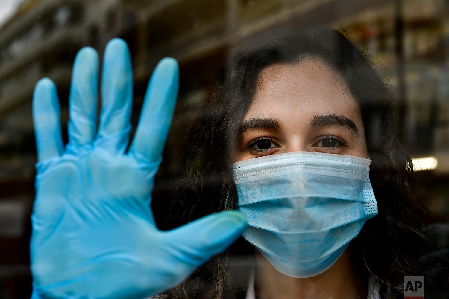  Chemist Amaya Pascual poses for a photograph in her pharmacy in Pamplona, northern Spain. (AP Photo/Alvaro Barrientos) 