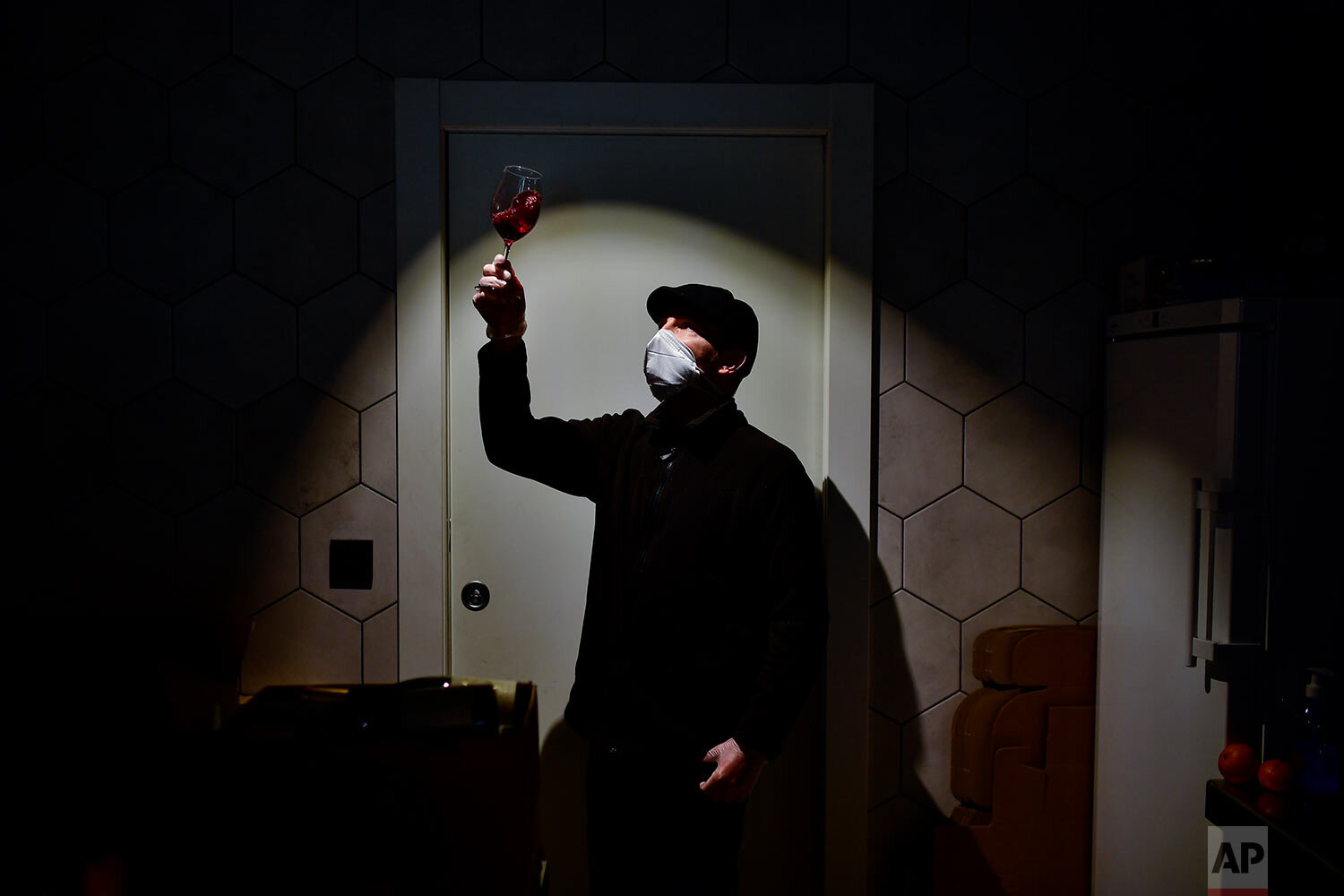  Javier Flamarique poses for a photograph at his wine store in Pamplona, northern Spain.(AP Photo/Alvaro Barrientos) 