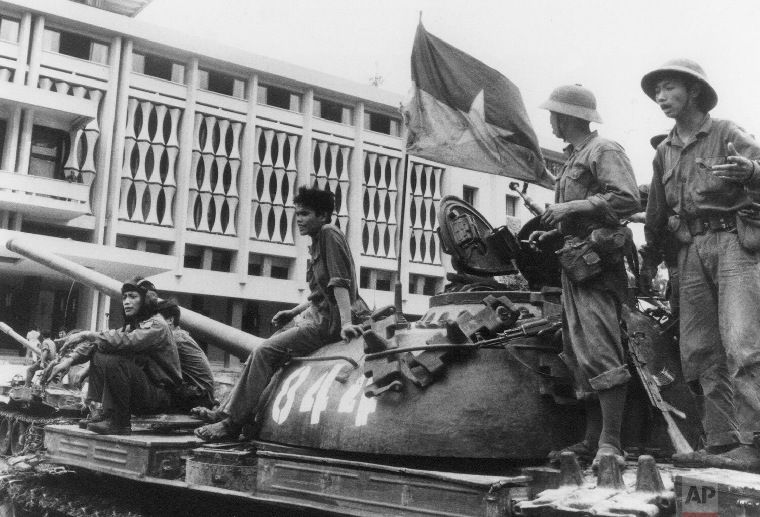 Provisional Revolutionary Government (PRG) forces enter Saigon and are seen parked outside the Independence Palace on April 30, 1975, minutes after the unconditional surrender of a Vietnam. (AP Photo) 