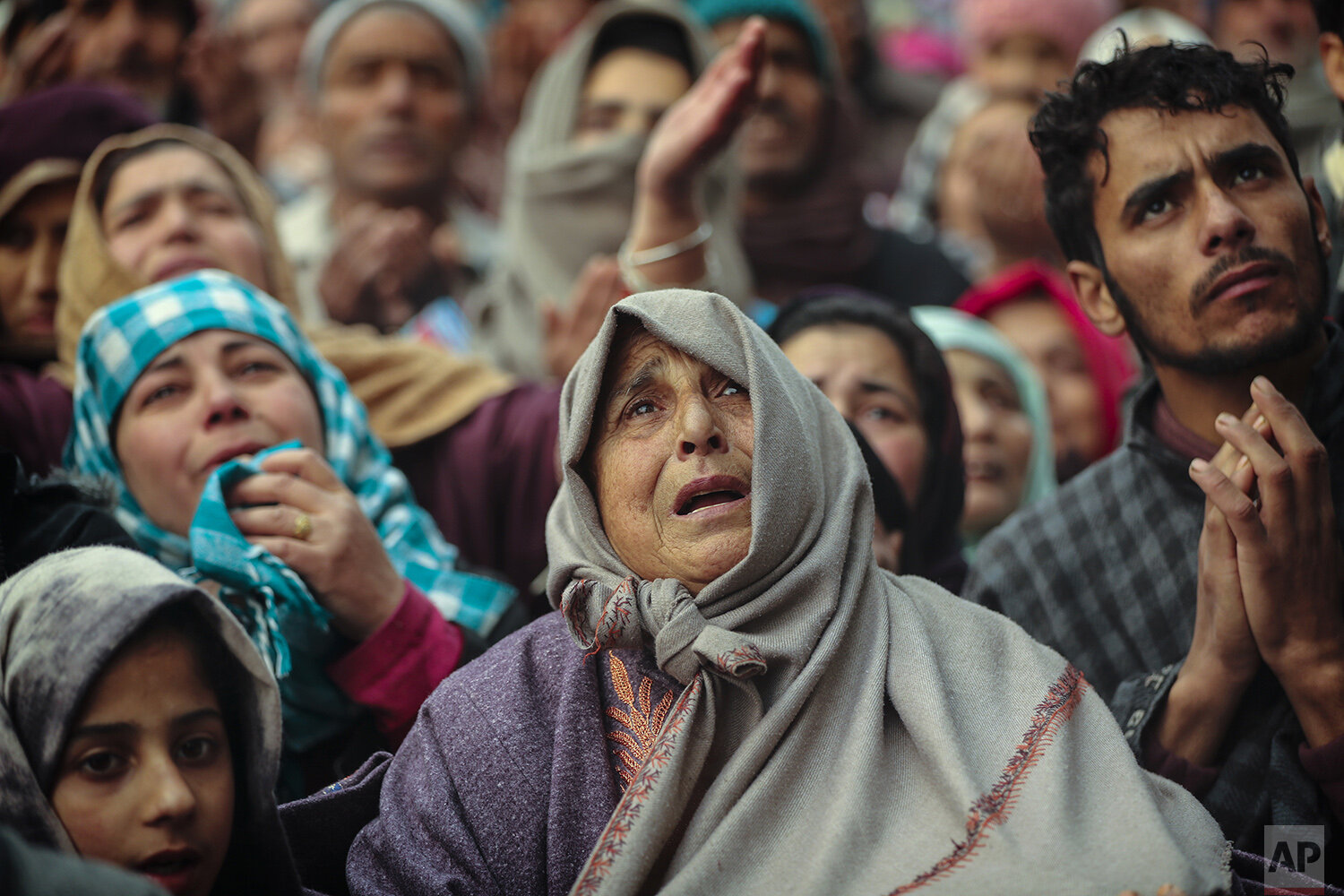  Kashmiri Muslim devotees offer prayer outside the shrine of Sufi saint Sheikh Syed Abdul Qadir Jeelani in Srinagar, Indian controlled Kashmir, Dec. 9, 2019. Hundreds of devotees gathered at the shrine for the 11-day festival that marks the death ann