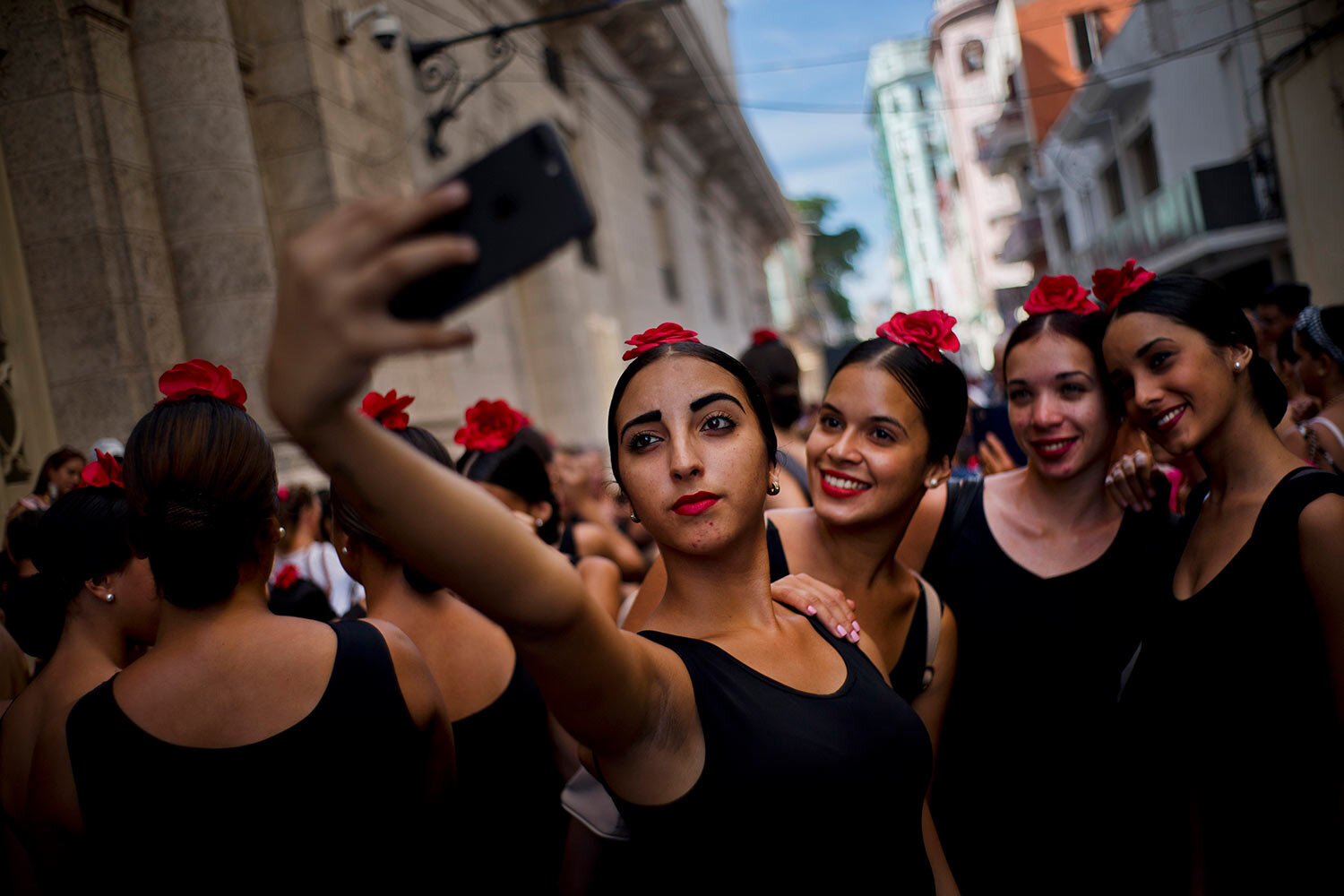  Young flamenco dancers take a selfie before performing in the street during the 26th International Ballet Festival in Havana, Cuba, Sunday, Nov. 4, 2018. (AP Photo/Ramon Espinosa) 