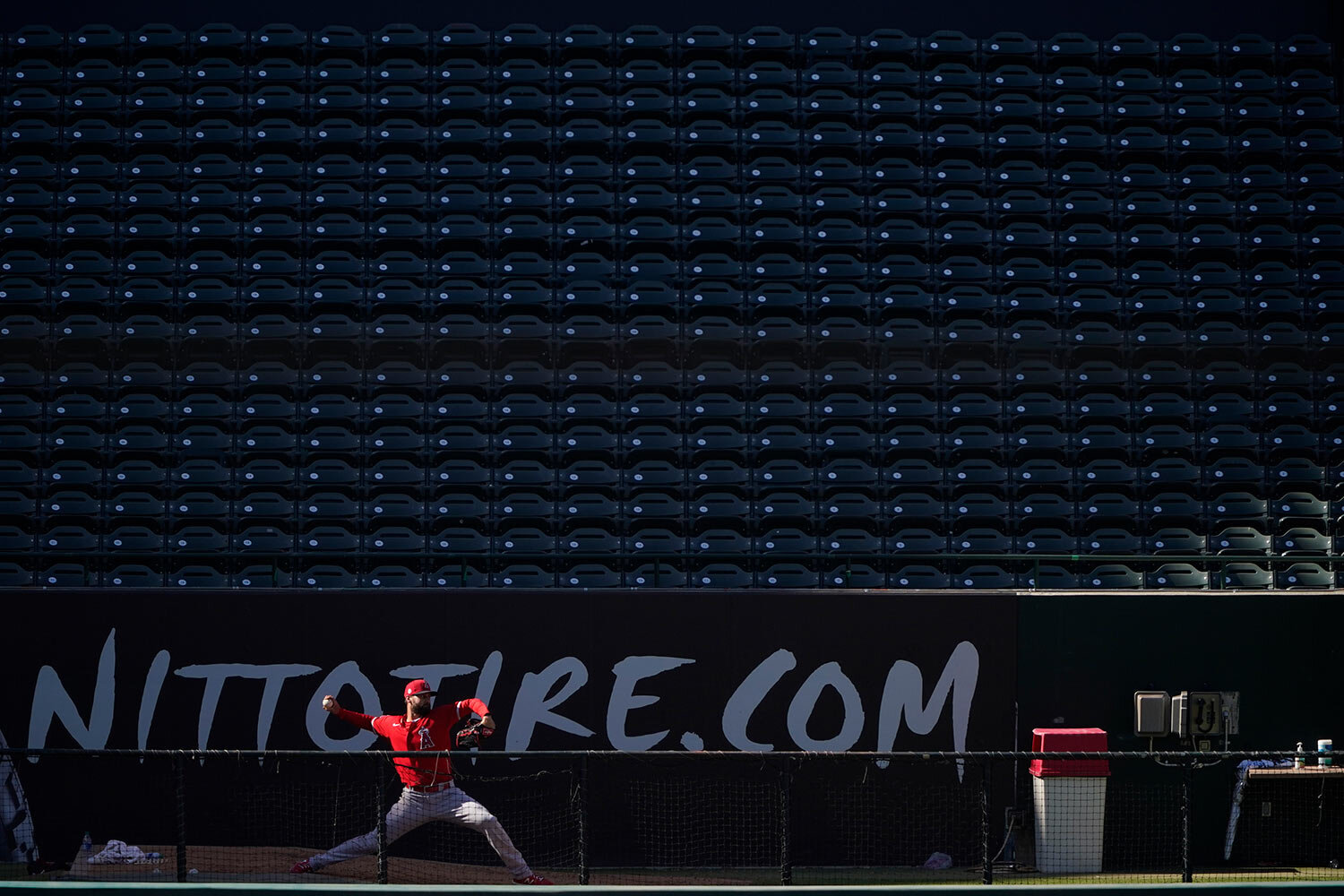  Los Angeles Angels relief pitcher Justin Anderson warms up in the bullpen during an intrasquad game at baseball practice at Angel Stadium, Friday, July 10, 2020, in Anaheim, Calif. (AP Photo/Ashley Landis) 