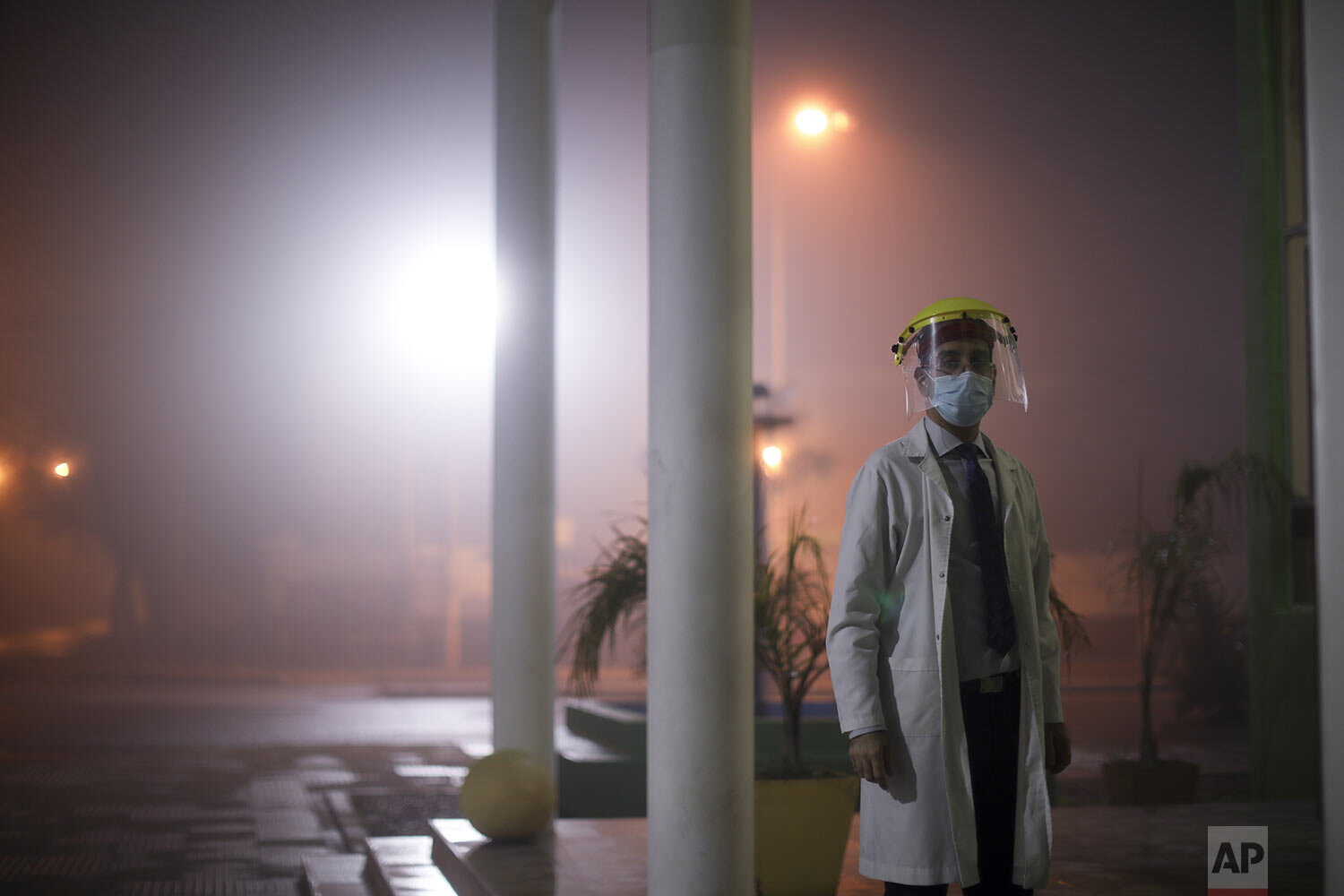  Dr. Matias Norte stands outside a hospital during a government-ordered lockdown to curb the spread of the new coronavirus in Buenos Aires, Argentina, Saturday, July 18, 2020. (AP Photo/Natacha Pisarenko) 
