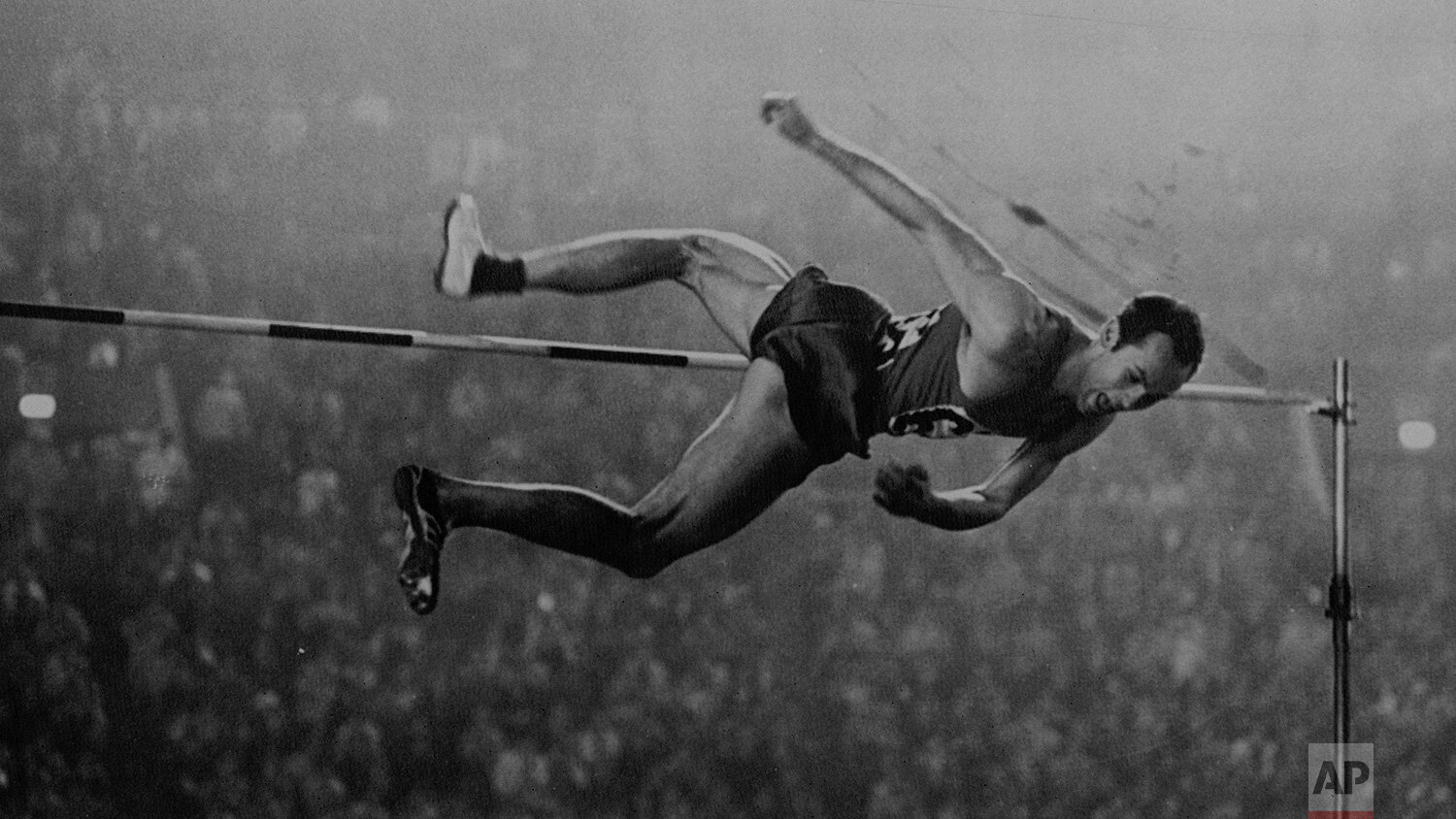  Valery Brumel of the USSR clears 7 feet, 1 3/4 inches, winning the gold medal in the high jump event in Tokyo, Japan, on Oct. 21, 1964. (AP Photo) 