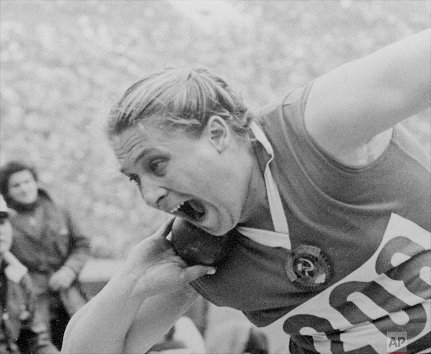  Tamara Press of the USSR shouts as she holds the ball poised for a shot put toss as she competed in the Olympic event in Tokyo on Oct. 20, 1964.  Tamara set a new Olympic record with a throw of 59 feet 6 1/4 inches as she won the gold medal.  (AP Ph