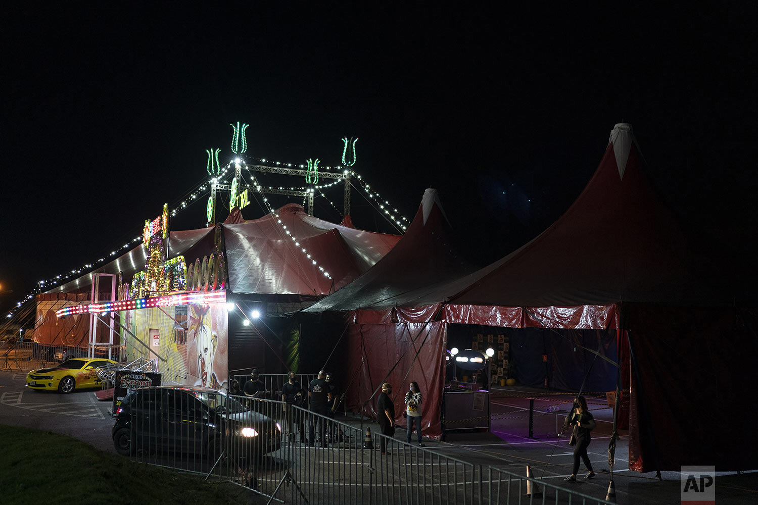  A car arrives at the Estoril Circus drive-in show in Itaguai, in greater Rio de Janeiro, Brazil, July 18, 2020. (AP Photo/Leo Correa) 