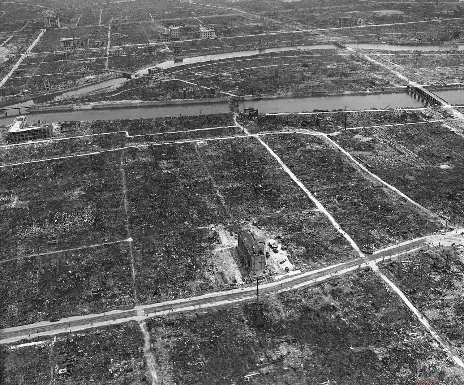  This is an aerial view of the remains of the city of Hiroshima, Japan, Sept. 5, 1945, one month after the atomic bomb was dropped on it. (AP Photo/Max Desfor) 