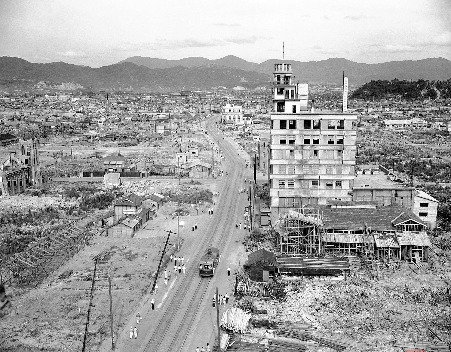  Hiroshima, Japan, still is a city of ruined buildings and vacant patches amid simple new structures, as seen in this air view made on July 20, 1946, almost one year after the atomic bomb burst there on August 6.  (AP Photo/Charles Gorry) 