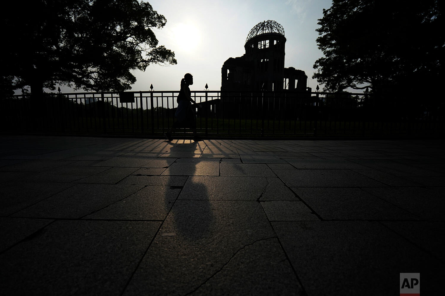  The Atomic Bomb Dome is seen at dusk in Hiroshima, western Japan, Monday, Aug. 3, 2020. (AP Photo/Eugene Hoshiko) 