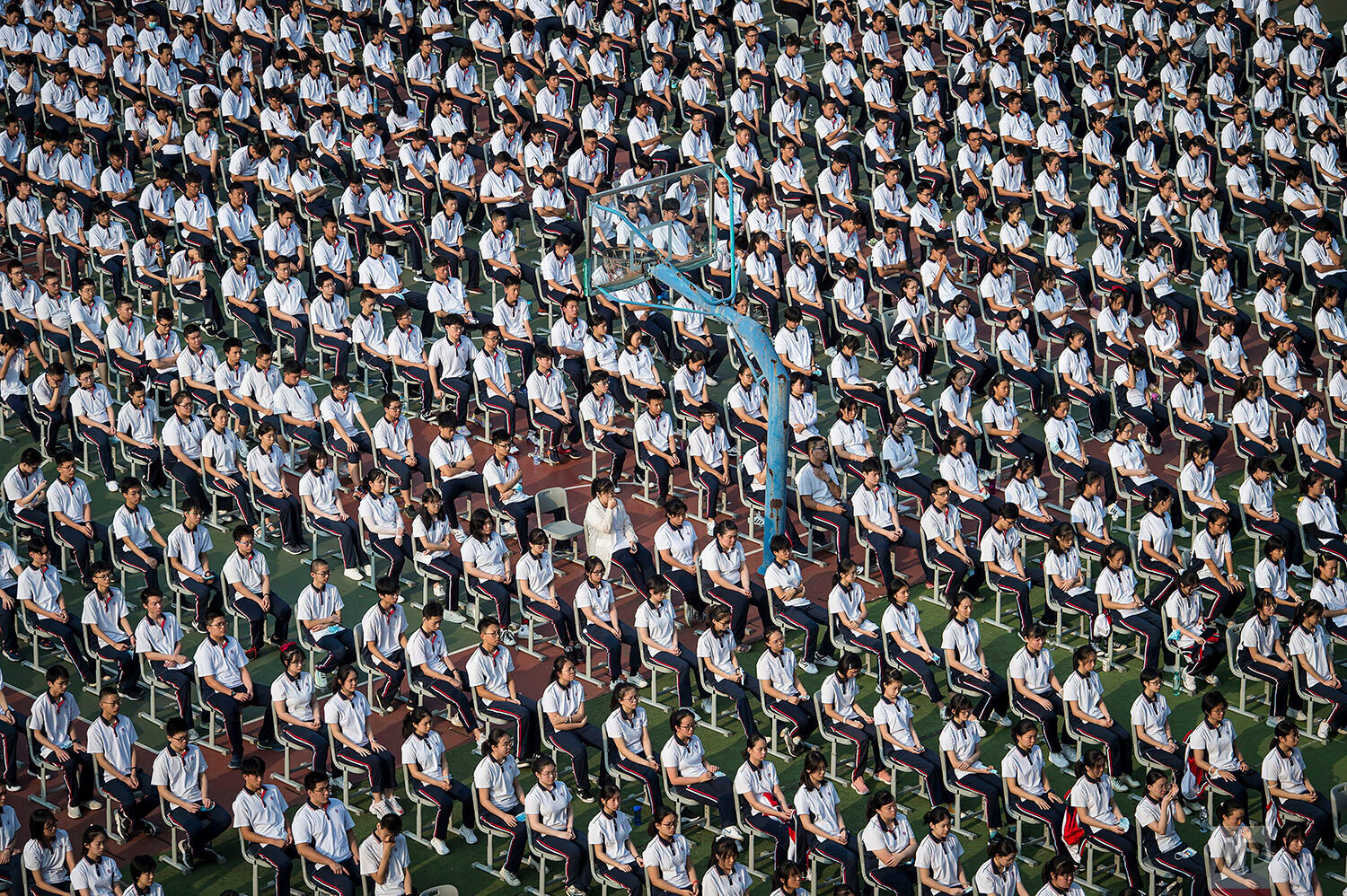  Students attend a ceremony to kick off the new semester in Wuhan High School in Wuhan in central China's Hubei province Tuesday, Sept. 1, 2020. (Chinatopix Via AP) 