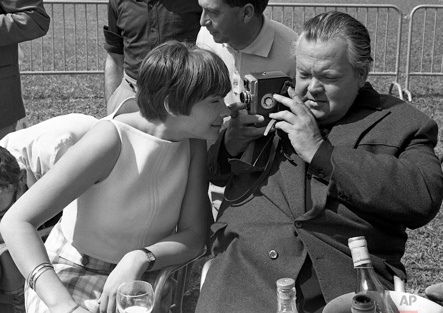  French actress Macha Meril peers into the lens of the camera as she is filmed by Orson Welles, during a garden party at the Cannes Film Festival, at the Mandelieu Golf Club, on May 8, 1966. (AP Photo/Jean-Jacques Levy) 