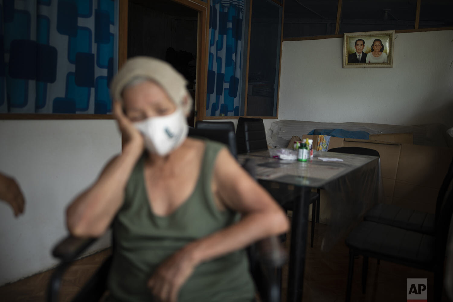  Suffering from a high fever related to dengue, 72-year-old Luz Rengifo rests inside her home, in Pucallpa, in Peru’s Ucayali region, Tuesday, Sept. 29, 2020. (AP Photo/Rodrigo Abd) 