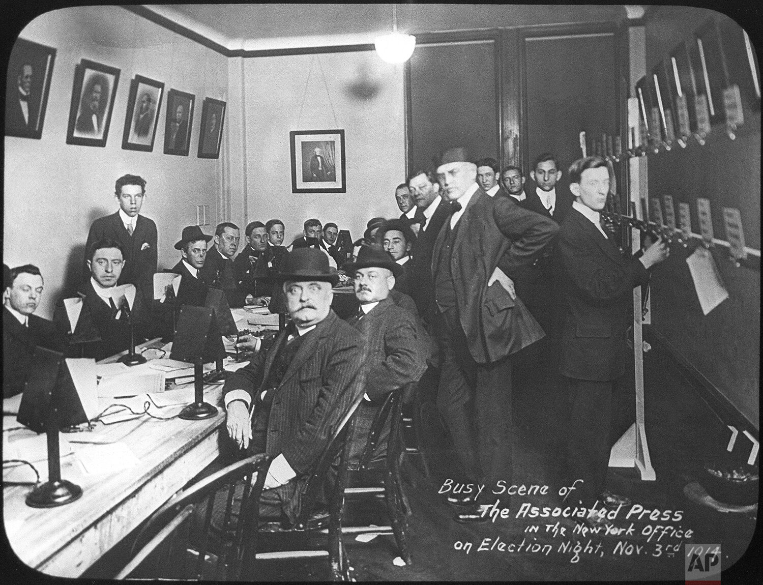  Workers crowd a room in the offices of The Associated Press in New York on election night, Nov. 3, 1914. (AP Photo) 