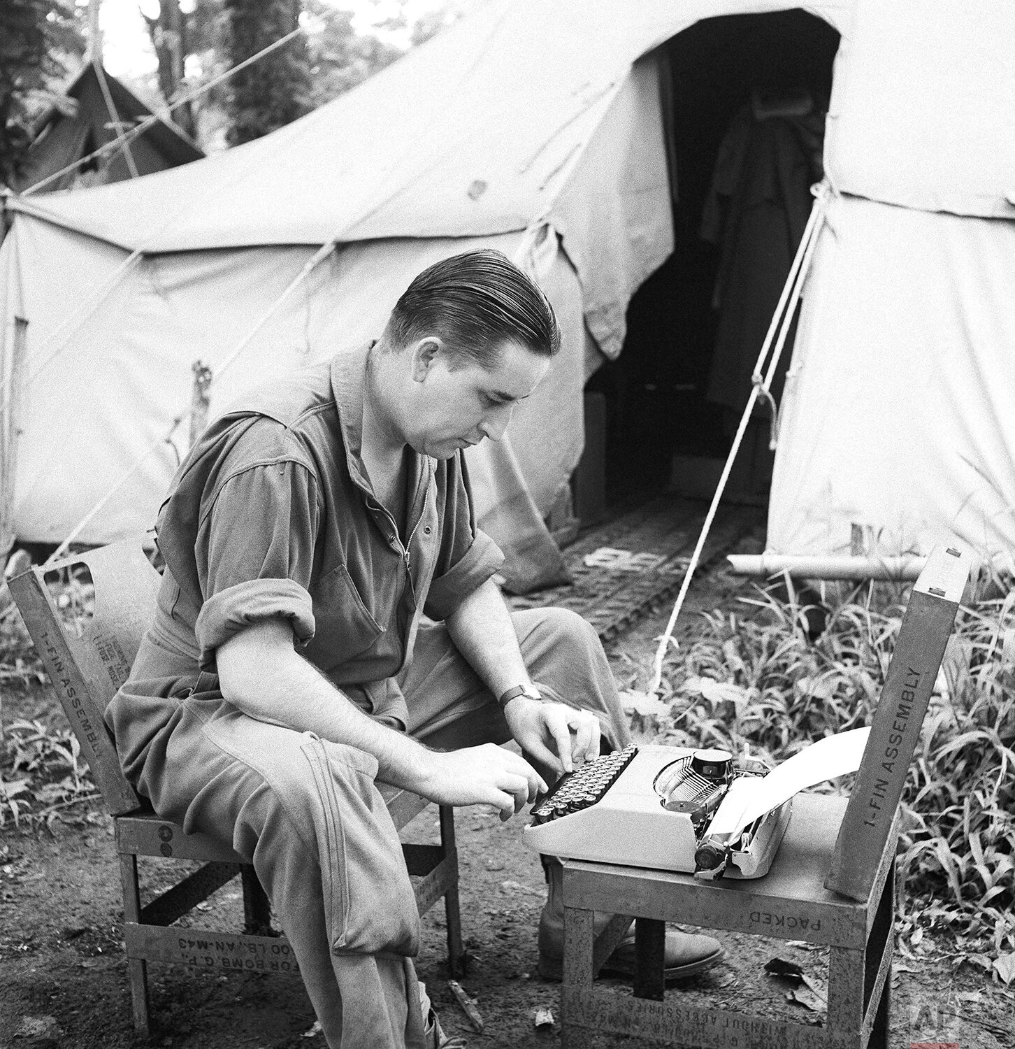  Olen Clements, Associated Press correspondent, at work at a South Pacific base on Feb. 13, 1943. (AP Photo/Jack Rice) 