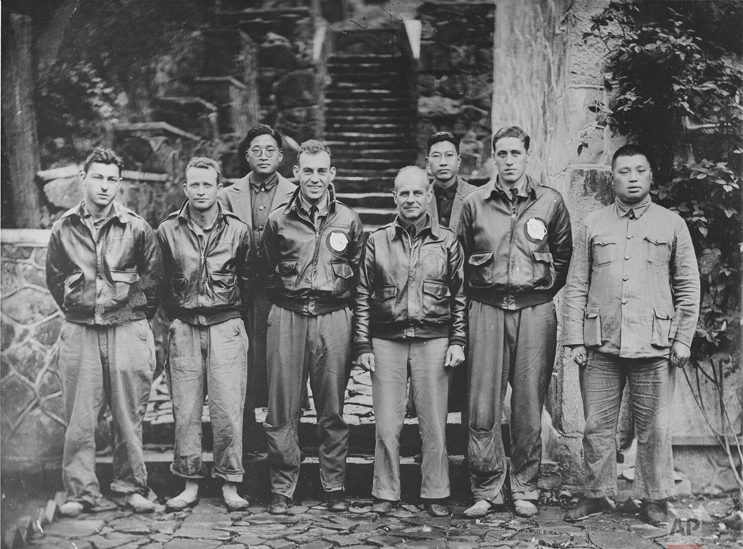  Maj. Gen. James Doolittle, his Tokyo bombing crew, and some Chinese friends are pictured in China after the U.S. airmen bailed out following the raid on Japan, April 18, 1942. From left: Staff Sgt. F.A.  Braemer, bombardier, of Seattle; Sgt. P.J. Le