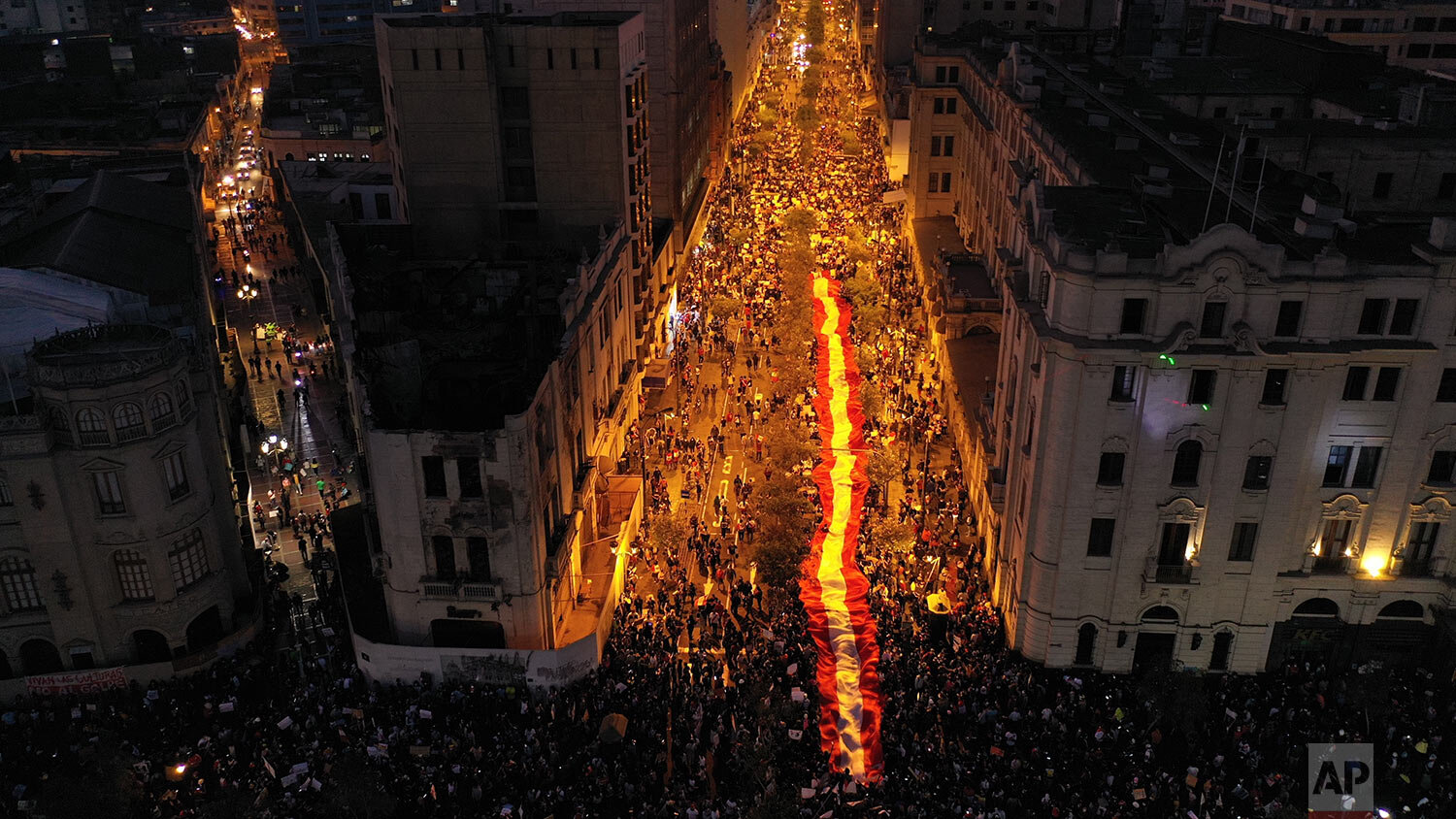  People who are refusing to recognize Peru's new government gather to protest in Lima, Saturday, Nov. 14, 2020. (AP Photo/Rodrigo Abd) 