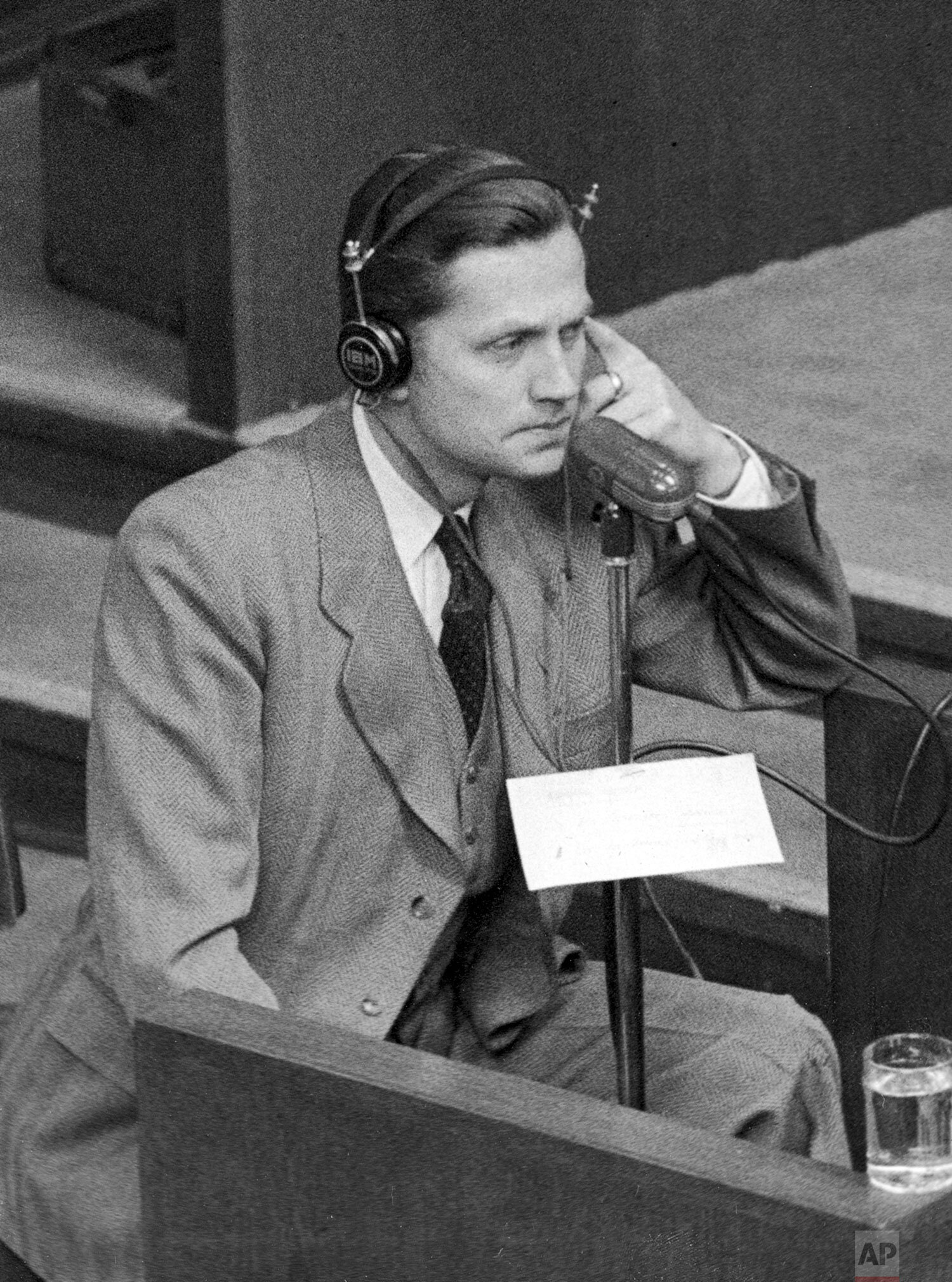  Former German Nazi SS-Brigadefuehrer and former head of foreign intelligence Walter Schellenberg is seen in the witness box on January 4, 1946 in Nuremberg, Germany during the war crime trials whilst giving evidence. (AP Photo/Eddie Worth) 